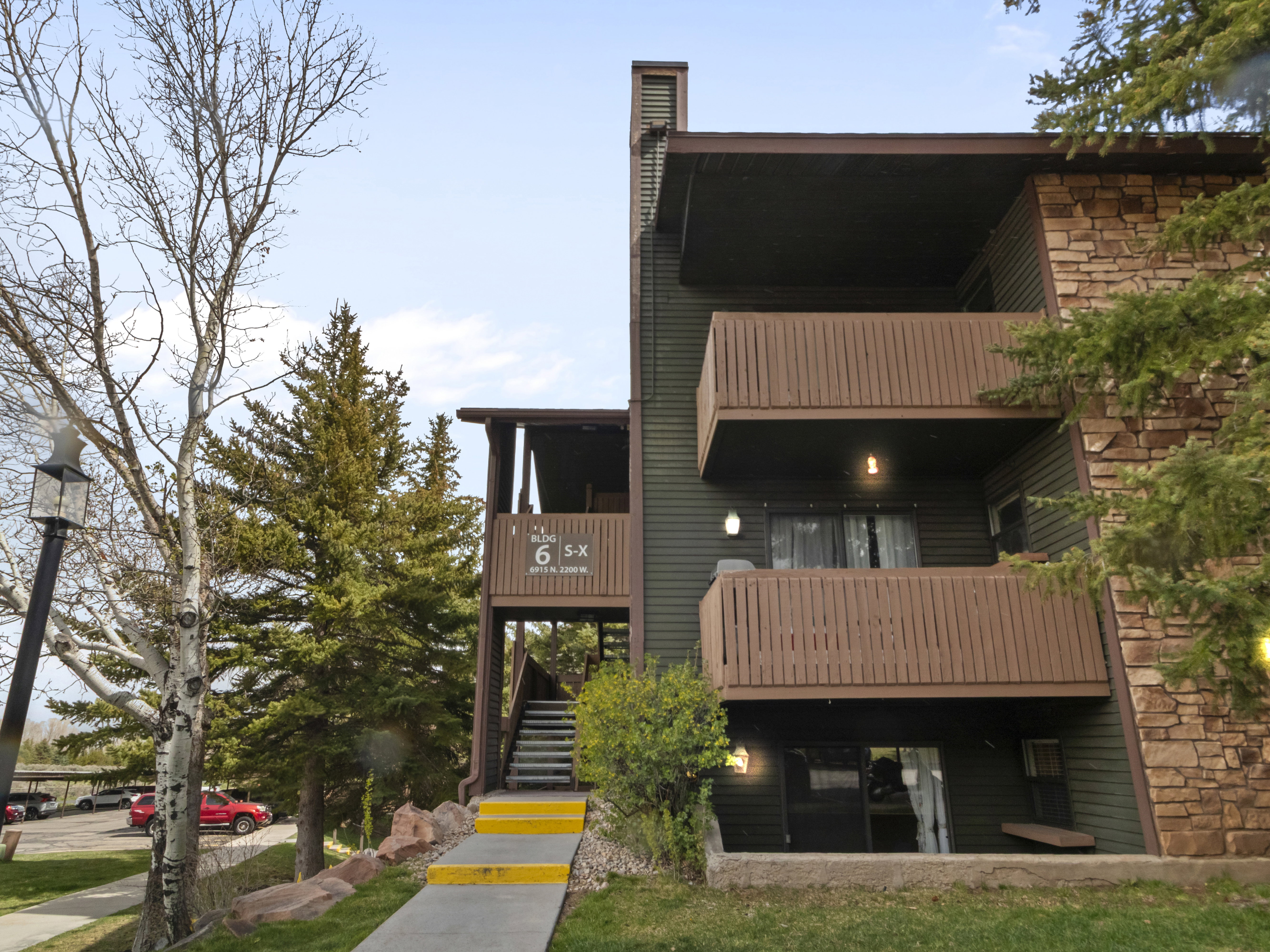 View of apartment building / complex featuring stairs