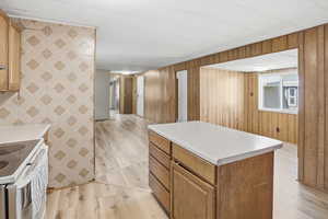 Kitchen featuring a kitchen island,Opening space for your dinning table.