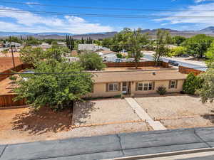 Single story home featuring a mountain view