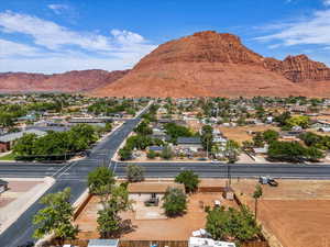 View of mountain background featuring nearby suburban area
