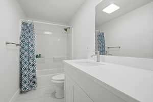 Full bathroom featuring vanity and shower / bath combo