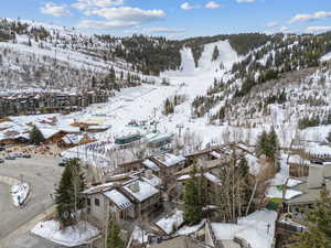 Snowy aerial view with a mountain view