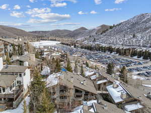 Snowy aerial view with a mountain view