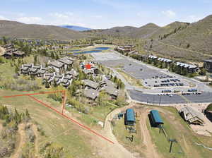 Aerial perspective of suburban area with mountains