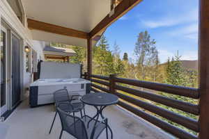 Balcony featuring a hot tub