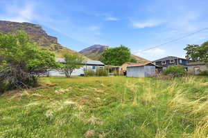 View of yard with a mountain view