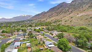 Aerial view of residential area with a mountain backdrop