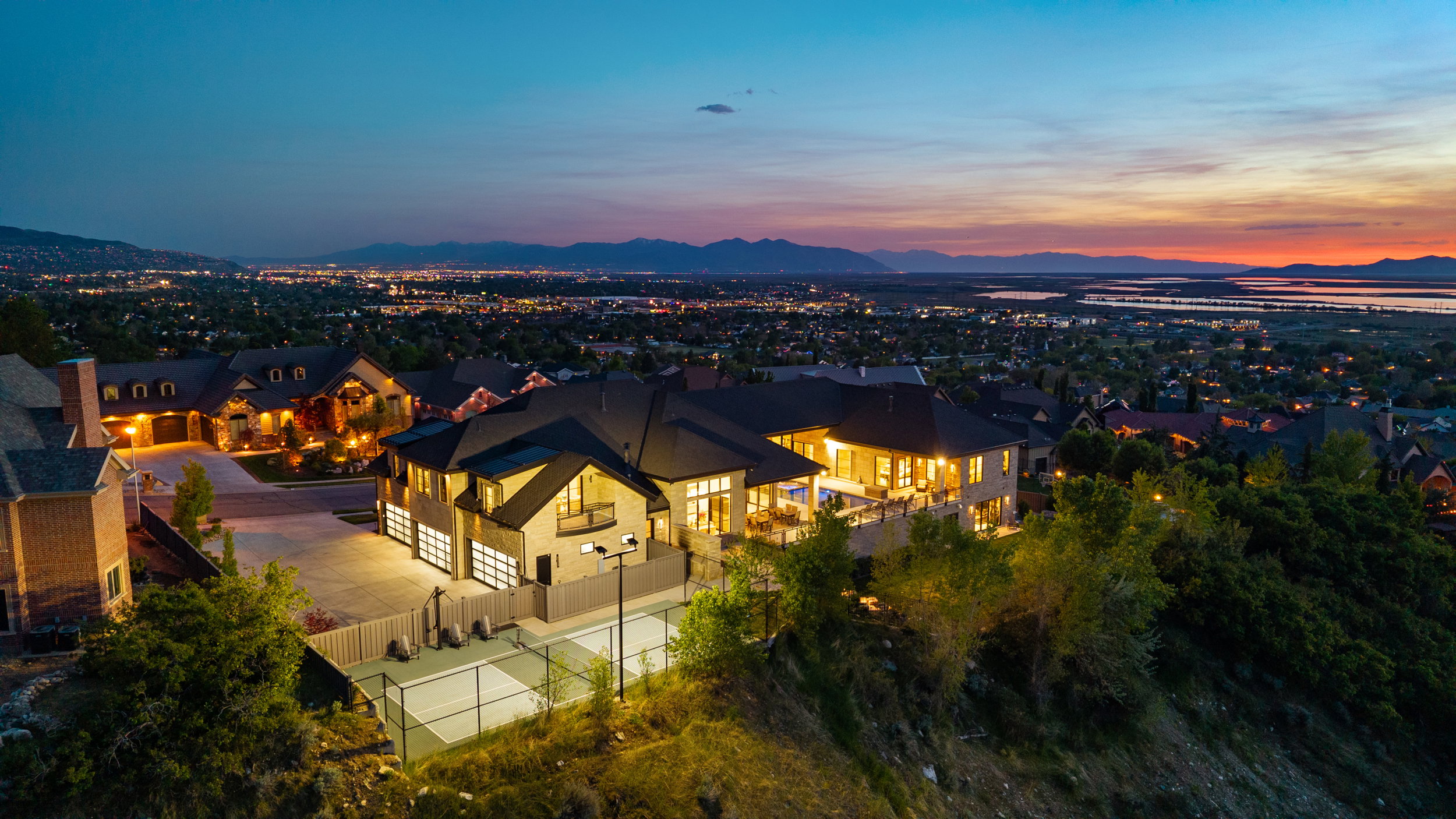 Aerial view at dusk of a mountain view and a residential view