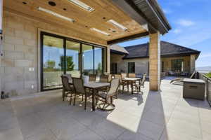 View of patio featuring outdoor dining space