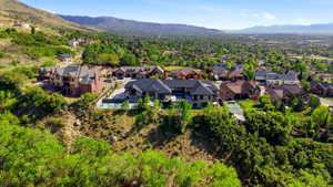 Aerial view of residential area with a mountainous background