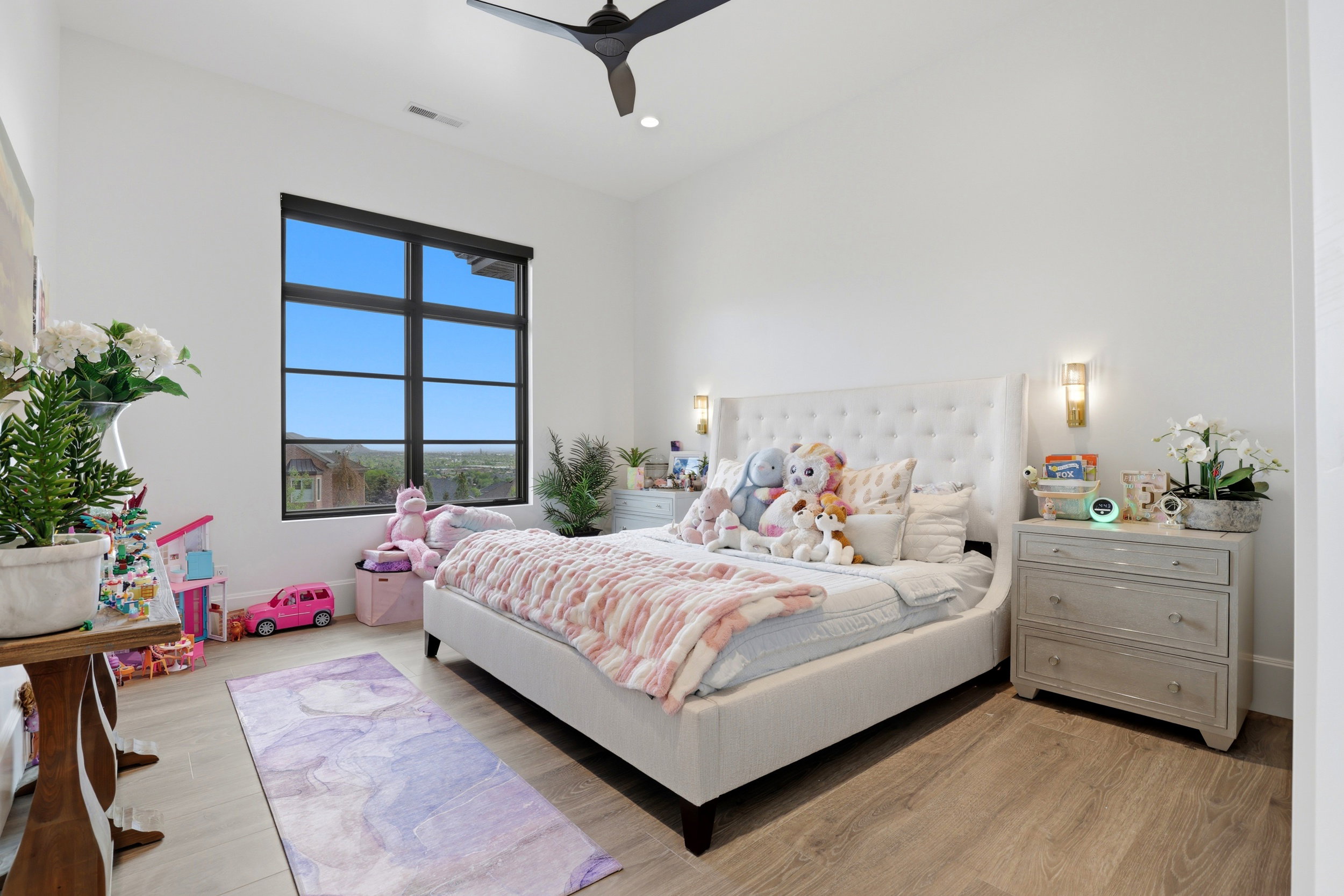 Bedroom featuring light wood-type flooring, ceiling fan, and recessed lighting