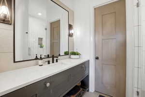 Full bathroom with vanity