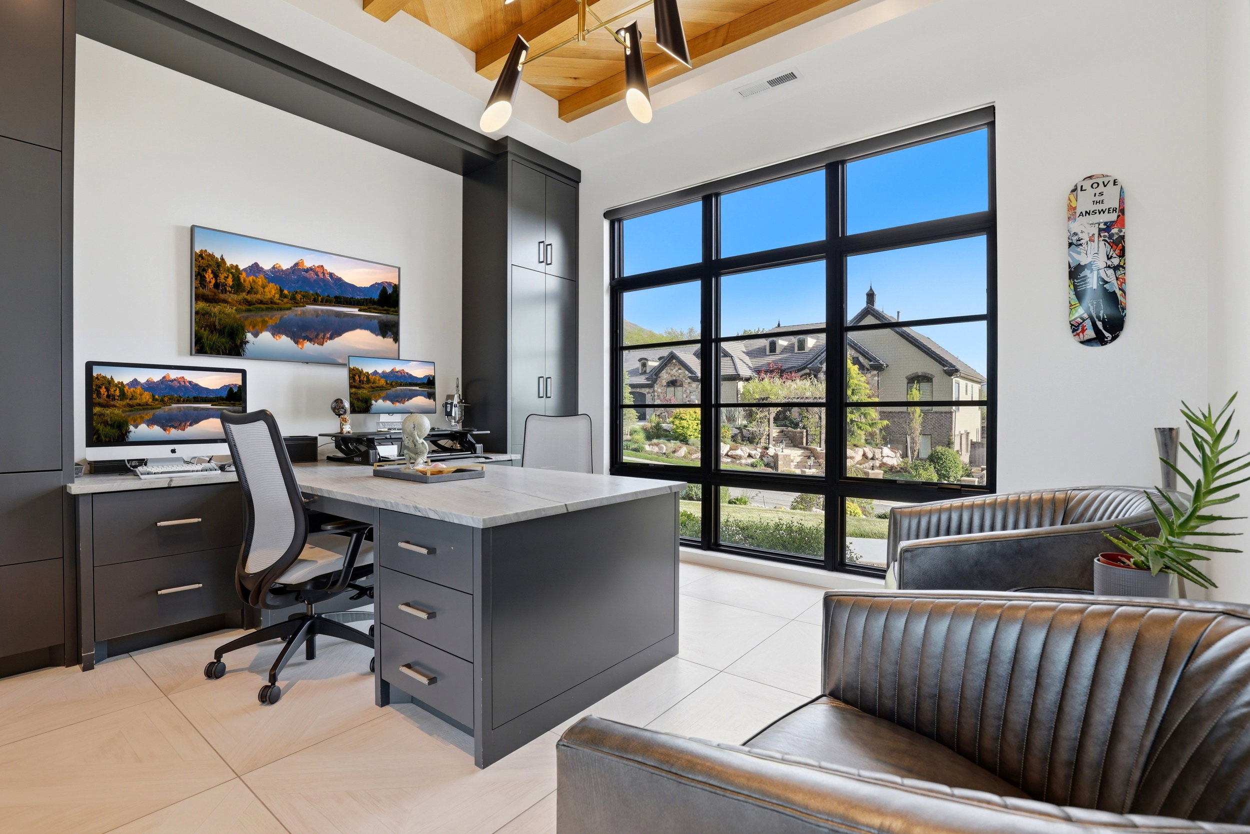 Office space with a wood ceiling with exposed beams and light tile patterned flooring
