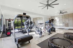 Exercise room with ceiling fan and recessed lighting