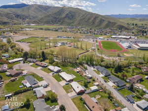 View of property location with nearby suburban area and a mountainous background