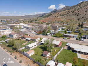 Aerial view of residential area with a mountainous background