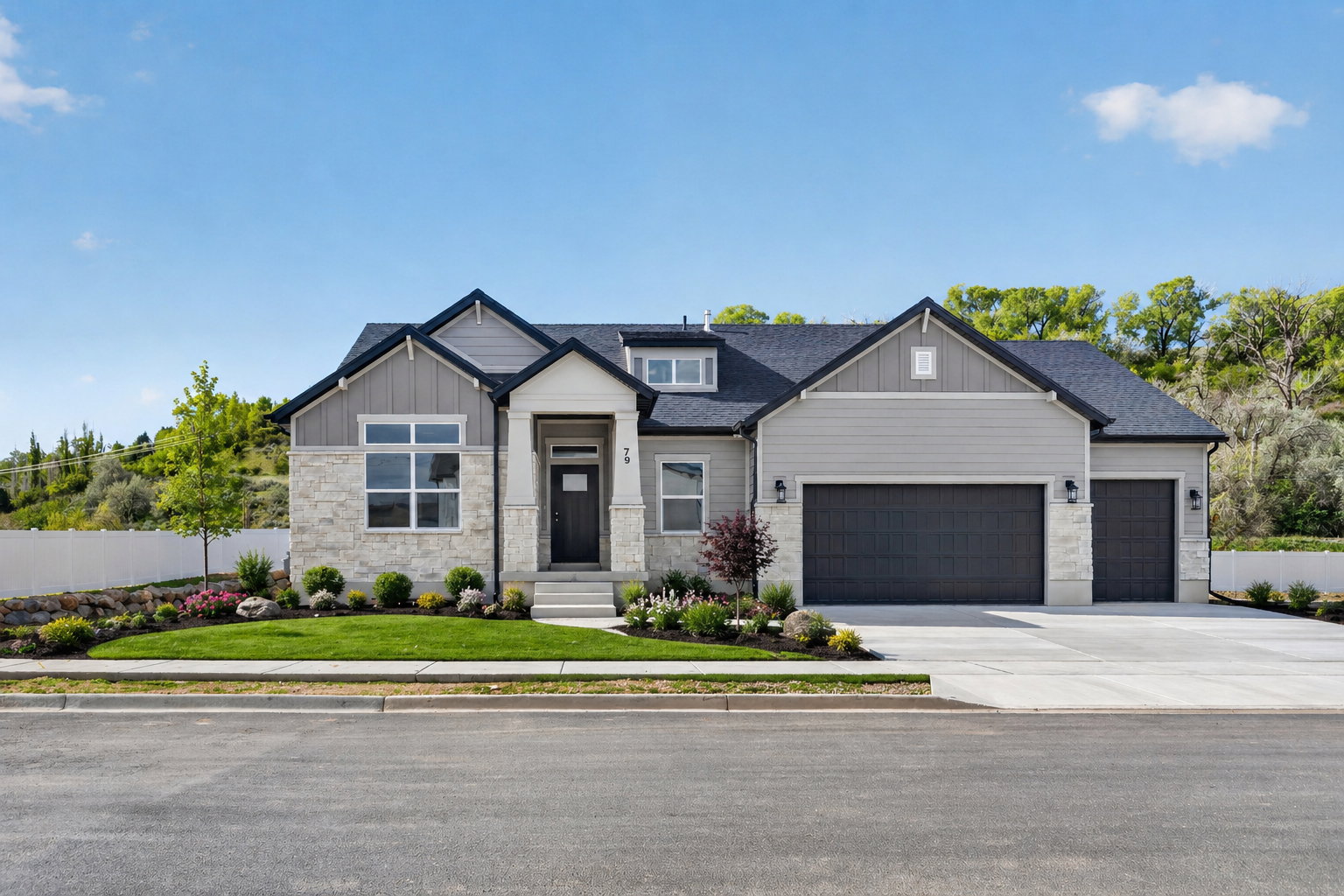 View of front facade featuring a garage, stone siding, driveway, a shingled roof, and board and batten siding