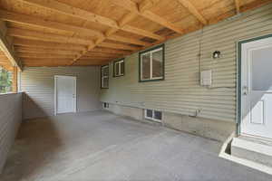 View of patio with an attached carport