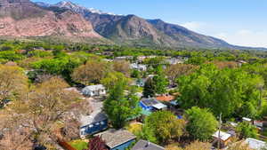 Aerial view of residential area featuring mountains
