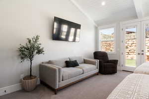 Carpeted bedroom featuring access to exterior, french doors, a vaulted wood ceiling, and recessed lighting