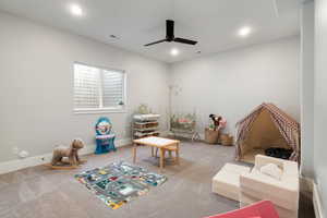 Rec room featuring carpet flooring, recessed lighting, and ceiling fan