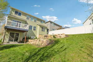 Back of house featuring stucco siding and a patio area