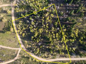 Aerial overview of property's location with property parcel outlined