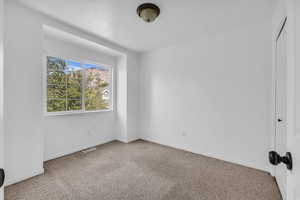 Carpeted bedroom