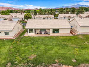 Aerial view of residential area with a mountain backdrop