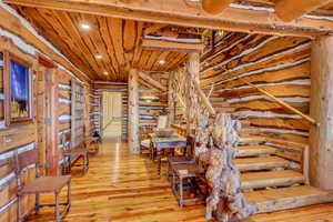Below grade area featuring hardwood / wood-style floors, recessed lighting, and wood ceiling