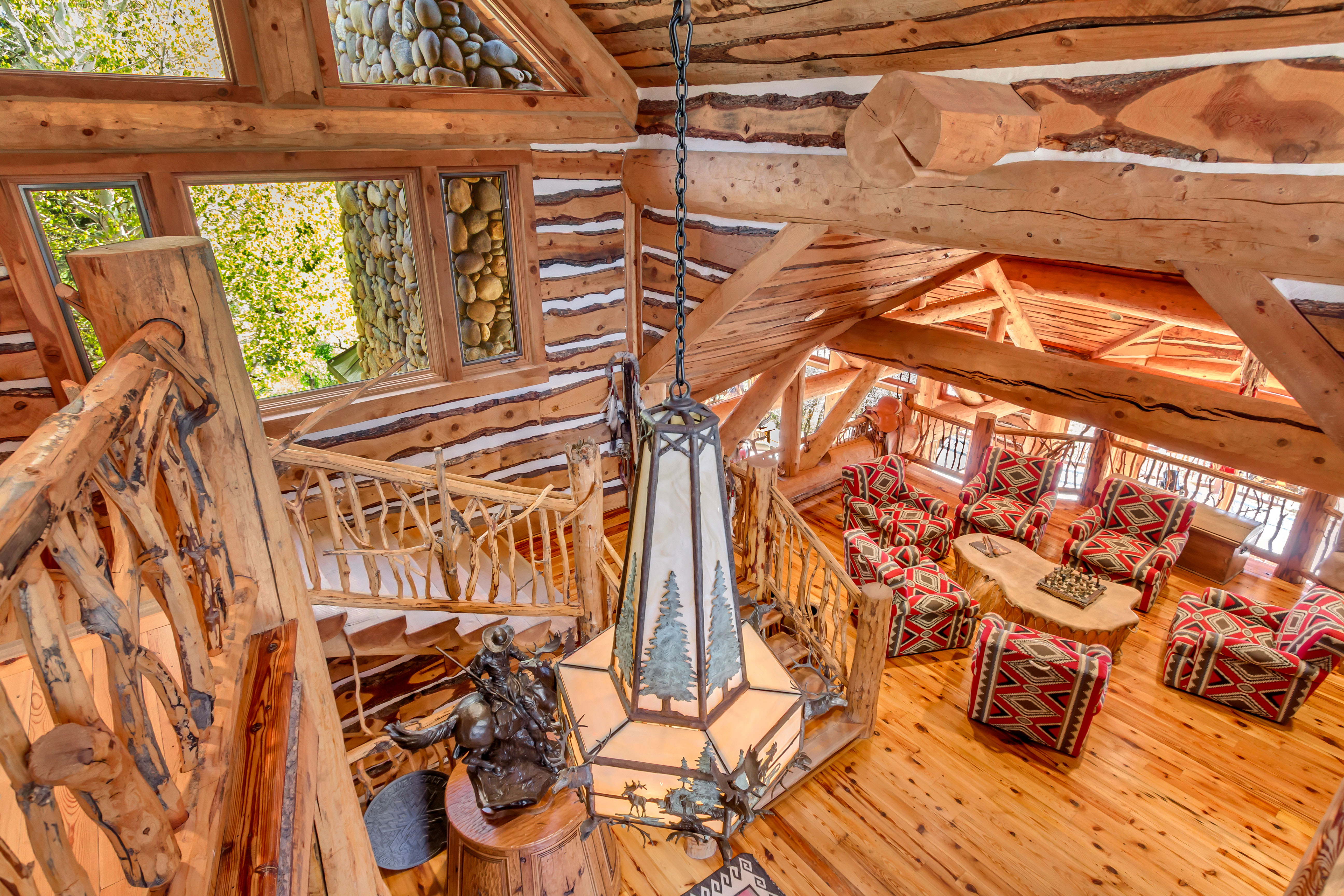 Detailed view of wood finished floors and log walls