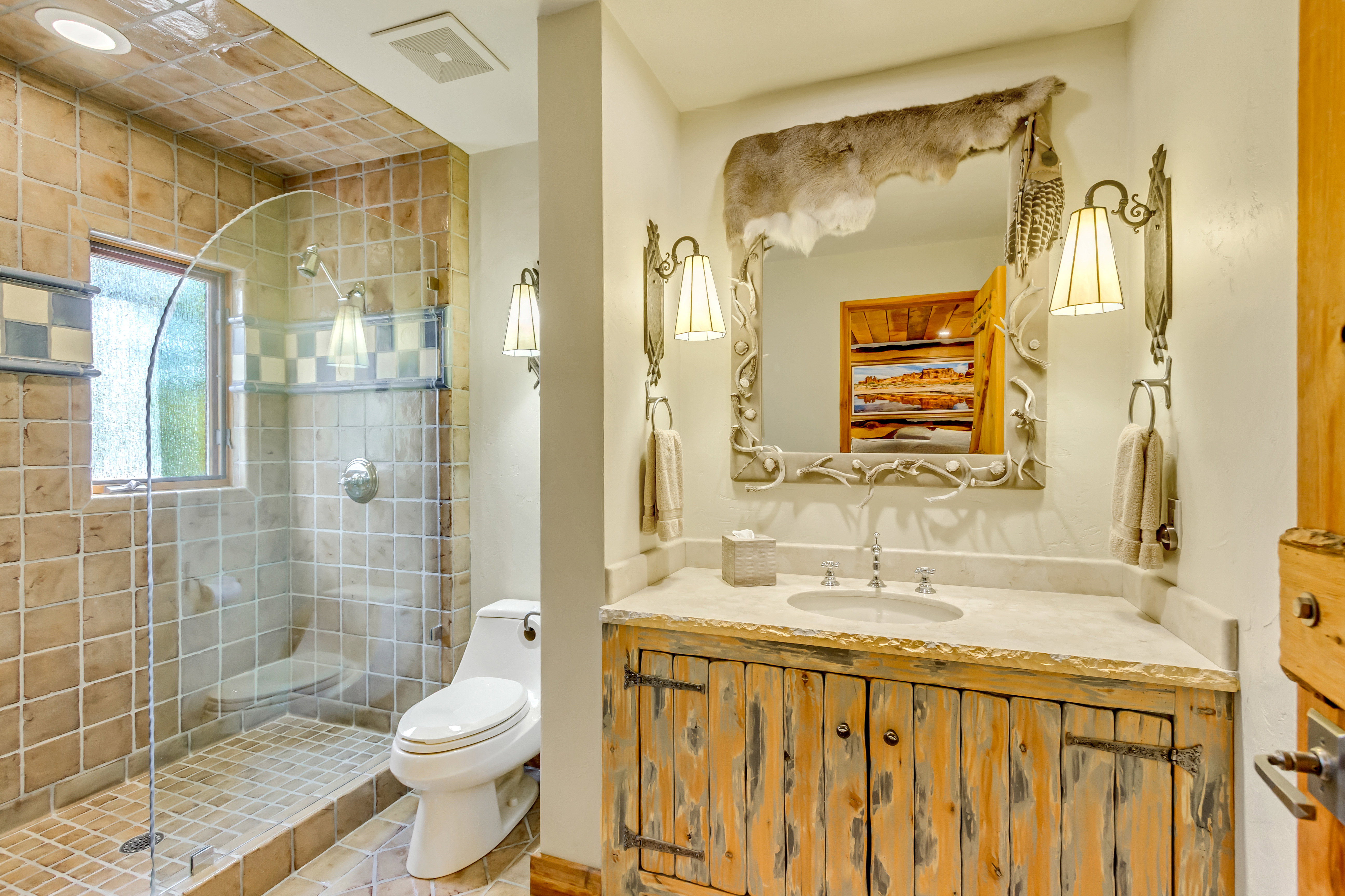 Full bath featuring vanity and a stall shower