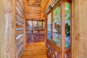 Entryway featuring wood-type flooring and french doors