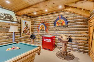 Game room with rustic walls, recessed lighting, billiards, light carpet, and wooden ceiling