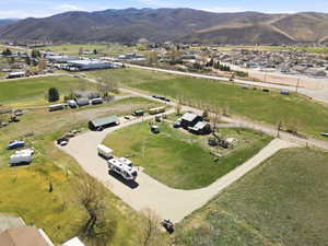 Aerial perspective of suburban area with a mountain backdrop