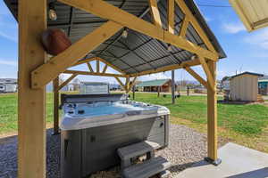 View of patio / terrace featuring a hot tub