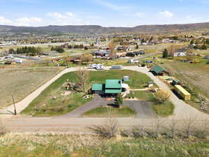 Overview of rural landscape featuring a mountain backdrop