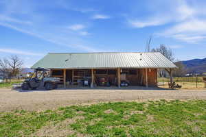 View of pole building featuring a mountain view