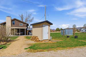 View of shed with a mountain view