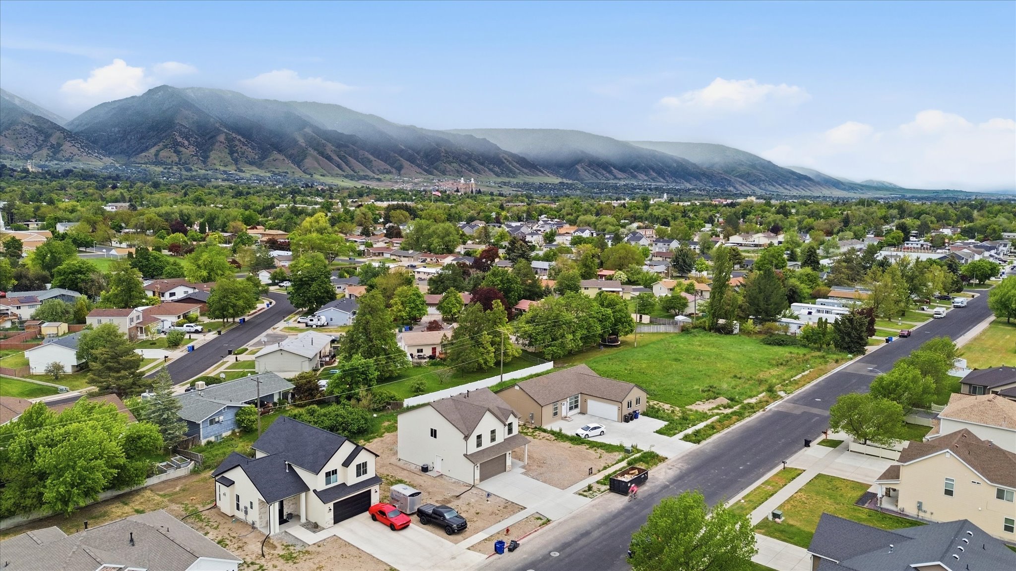 Residential neighborhood featuring a prominent mountain backdrop