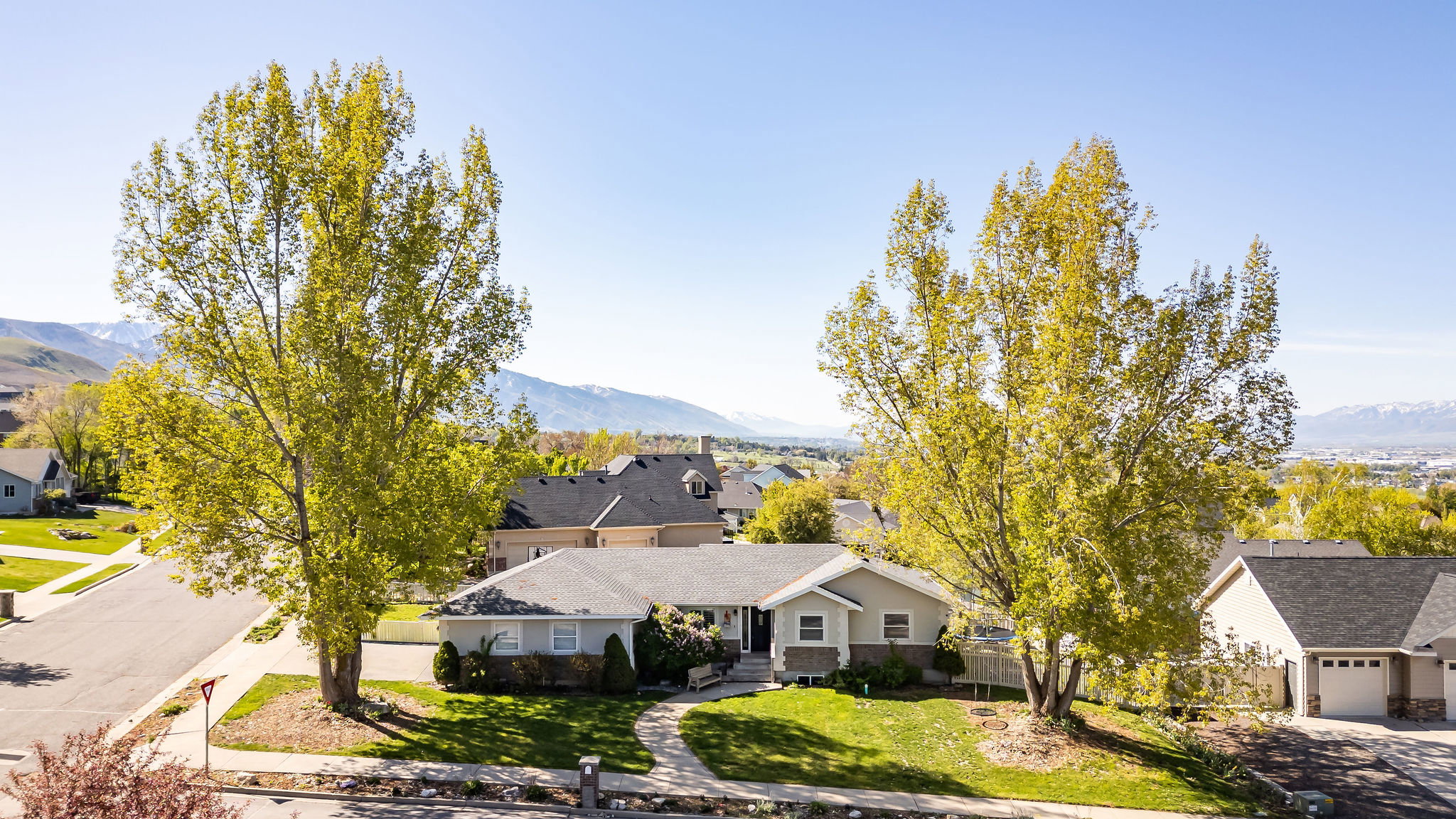 View of mountain background featuring nearby suburban area