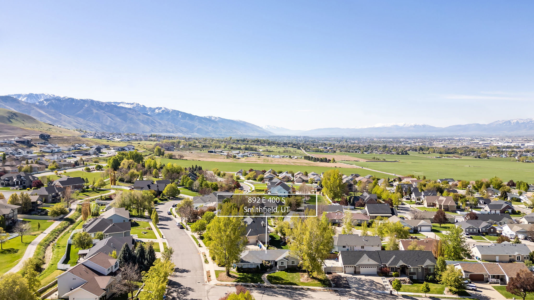 Aerial view of residential area with a mountain backdrop