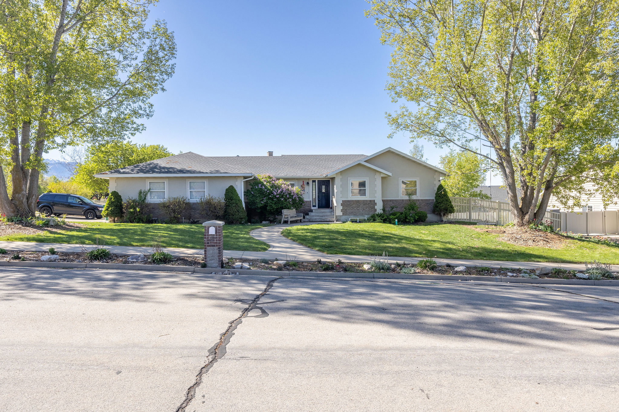 View of front of home featuring stucco siding