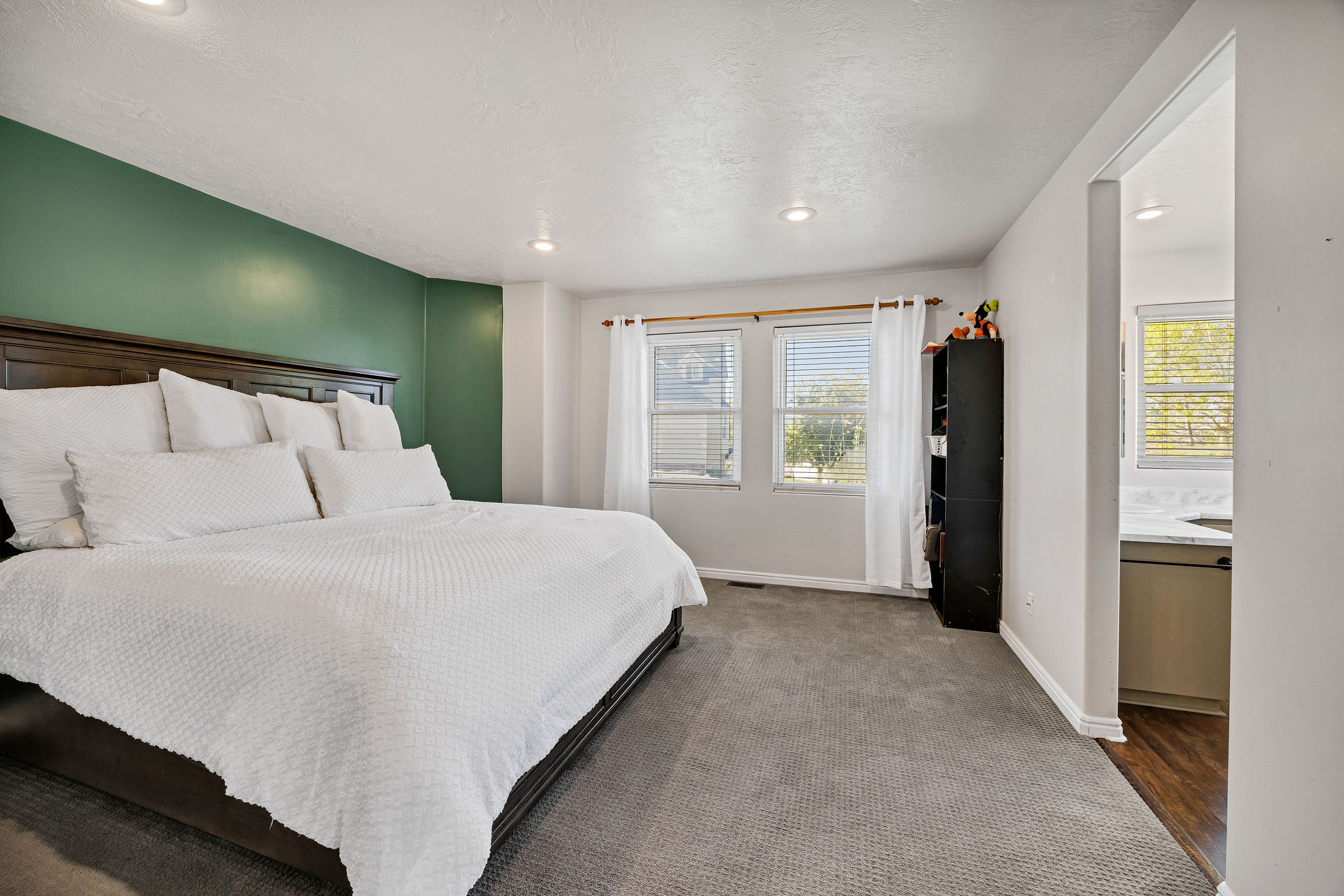 Bedroom featuring carpet flooring and recessed lighting