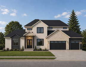 Contemporary residence featuring a stucco and stone facade with dark trim accents