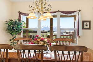 Dining room featuring a mountain view