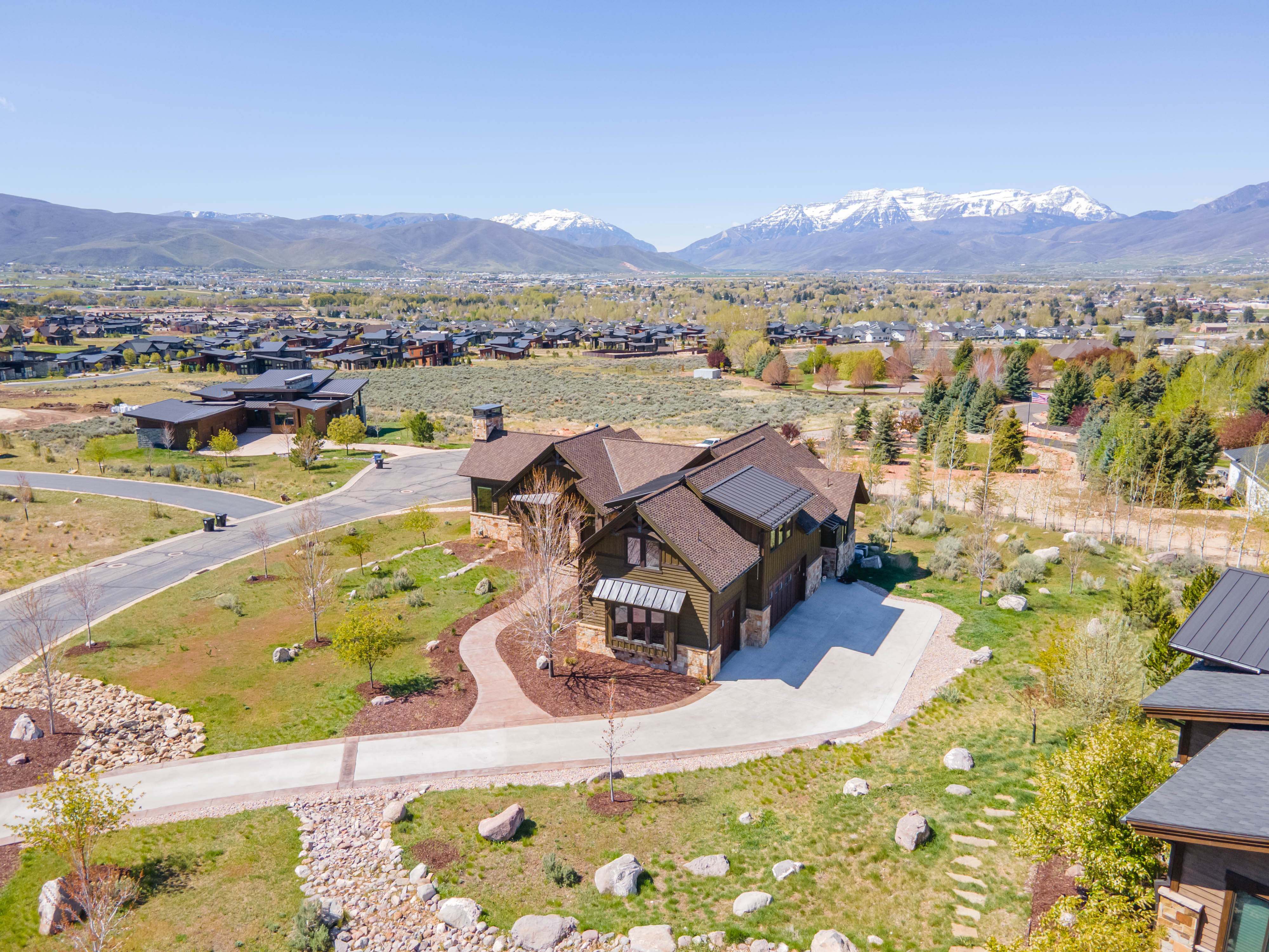 Aerial view of residential area featuring mountains