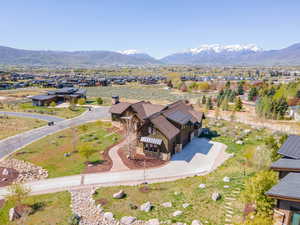 Aerial view of residential area featuring mountains