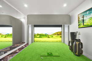 Game room with a mountain view, golf simulator, and recessed lighting
