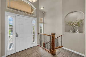 Entryway featuring light tile patterned flooring